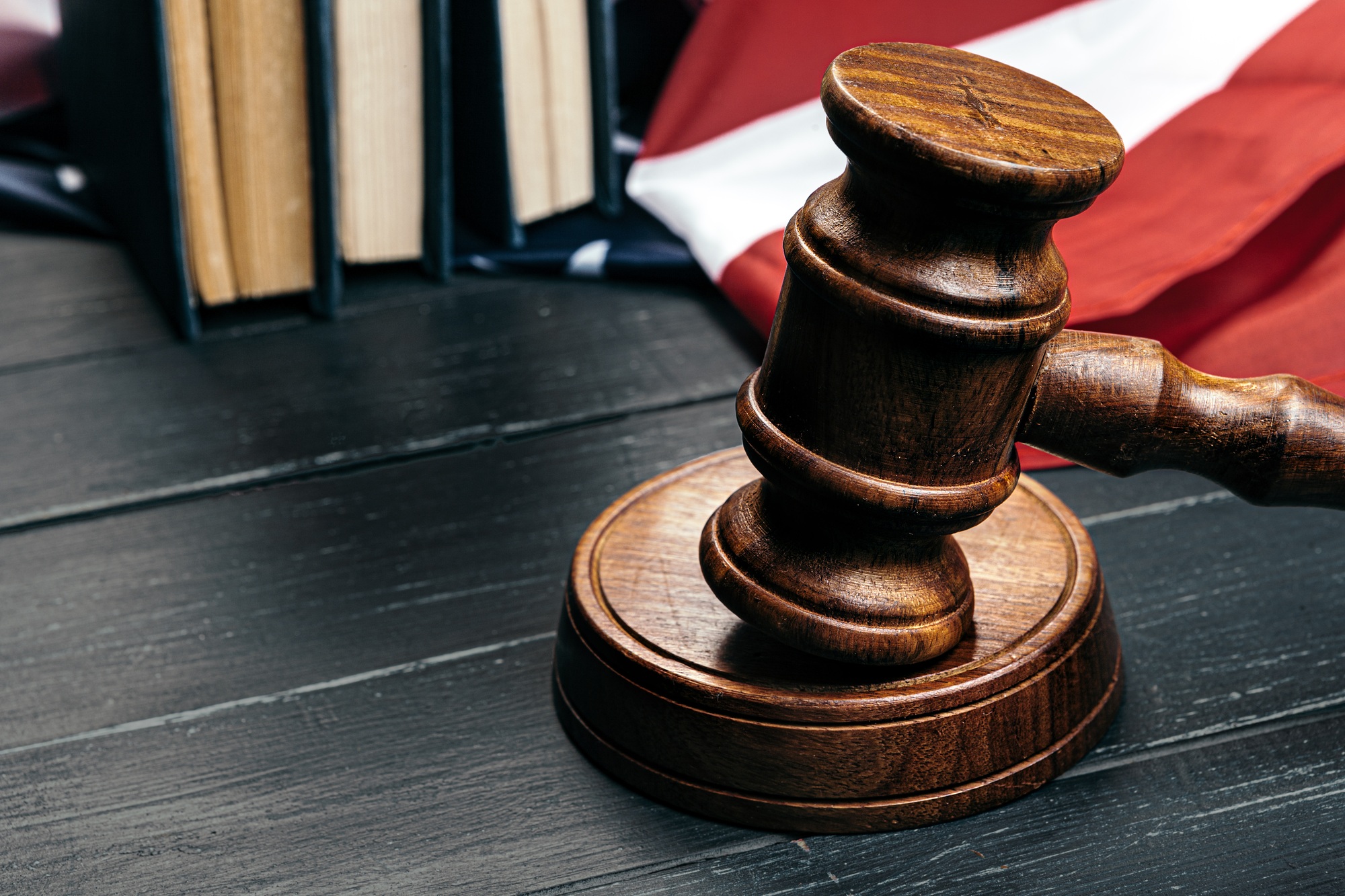 Judge gavel on the background of the flag united states of America