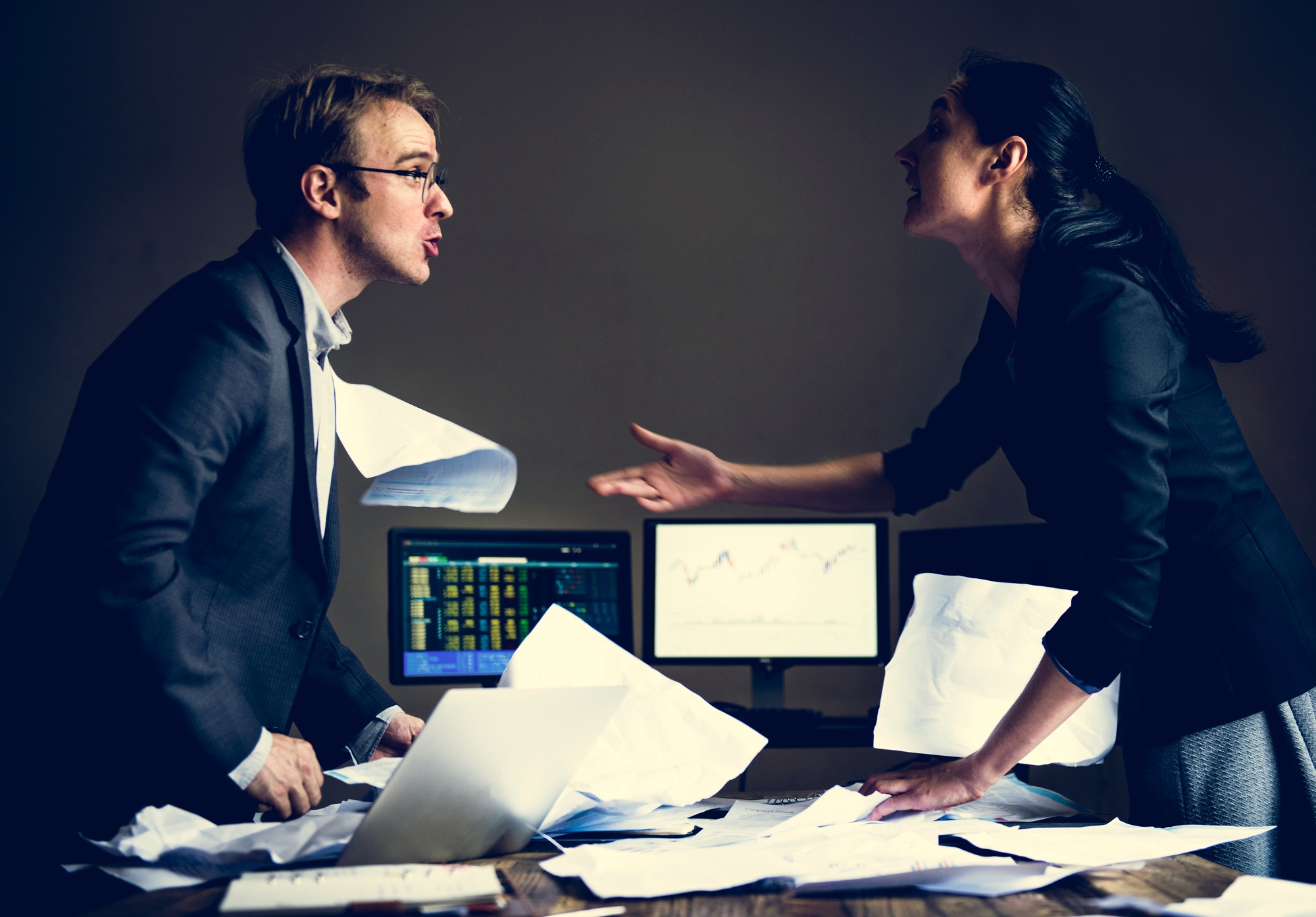 Business partner fighting while they are meeting